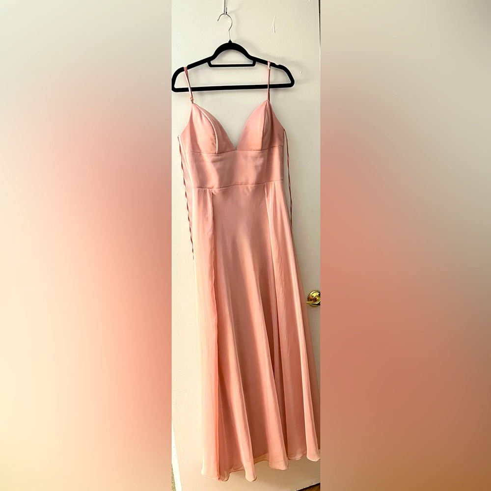 Light pink bridesmaid dress. Some stains on the bottom from the beach.
